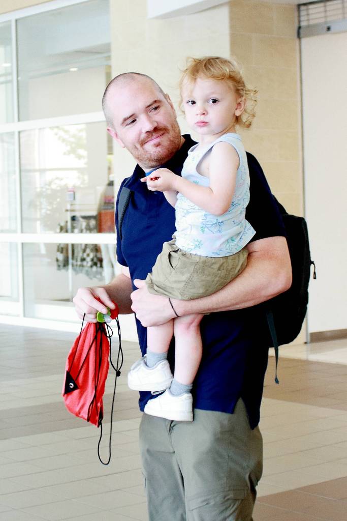 Jared Gloster and son Gavin at the Commons Mall in Federal Way. Photo by Keelin Everly-Lang / The Mirror