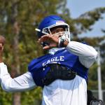 Federal Way QB warms up for practice. Ben Ray / The Mirror