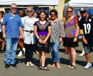 Federal Ways Got Talent is held at the Federal Way Farmers Market. Pictured left to right: Paul Frink (judge), Karen Burgato (judge), Aimee Coronado (winner), Billie Bohannon (judge), Vickie Chynoweth (sponsor), Ben Reeves (DJ). Photos by Bruce Honda