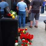Community members view the permanant memorial display at Fire Station 64. Photo by Keelin Everly-Lang / The Mirror