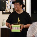 Helena Reynolds is a Federal Way community member who partnered with Mary Anne Hamilton to write the book about her life as the descendent of a U.S. Founding Father. Helena connected with Mary Anne through the Alexander Hamilton Awareness society and here prepares to draw names for a free copy of the new book. 
Photo by Keelin Everly-Lang / The Mirror