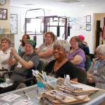Photo by Keelin Everly-Lang / The Mirror
Audience members cheer for Mary Anne Hamilton and Helena Reynolds as they finish their presentation about the new book. Several members of the audience were also participants in an Alexander Hamilton discussion group that Helena led in Kent.