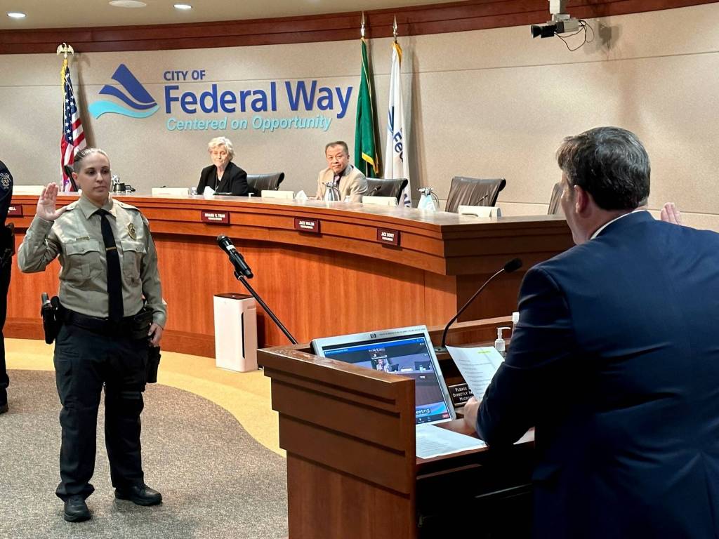 New Jail Transport Officer Matlock is sworn in by Mayor Ferrell. Photo provided by the city of Federal Way.