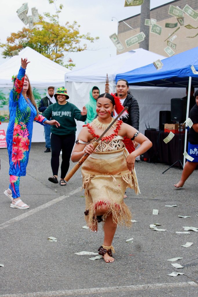 Photo by Keelin Everly-Lang / The Mirror
A member of the Federal Way High Schools Pacific Islander Club stars as the main dancer in the Taualuga dance.