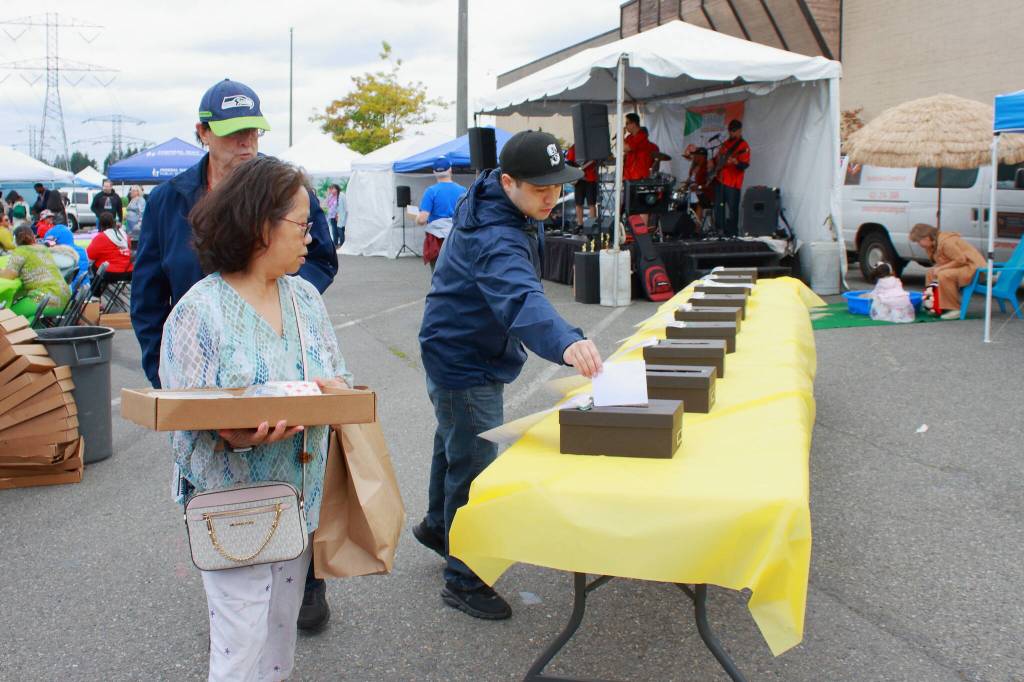 Photo by Keelin Everly-Lang/The Mirror
Guests voted for their favorite restaurant at The Taste of Federal Way. The event concludes with awards given by judges as well as for Peoples Choice, based on votes dropped in these boxes throughout the day.