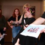 At a hair demonstration at a recent team energizer event, Bella Red employees learn new techniques. Photo by Keelin Everly-Lang /The Mirror