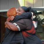 Photo by Keelin Everly-Lang / The Mirror
Kristin Speakman and stylist Roslynn share a hug during a recent team Energizer event.