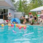 Photo by Keelin Everly-Lang / The Mirror
Kristin Speakman joins the fun with her team at a pool party team Energizer event for Bella Red employees.