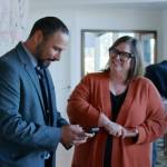 Moises Cortez III talks with Mo Bailey, a staff member at the Washington Healthcare Authority and former Oxford House resident.