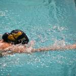 A Decatur swimmer lunges to the finish. Ben Ray / The Mirror