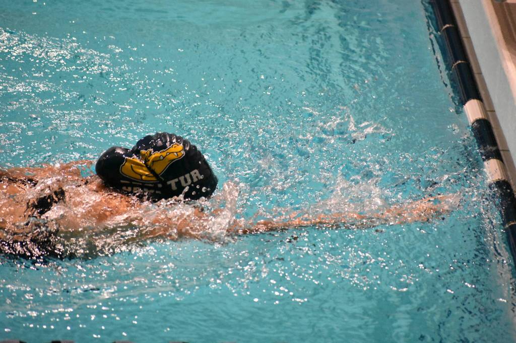 A Decatur swimmer lunges to the finish. Ben Ray / The Mirror