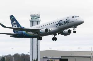 An Alaska Airlines plane takes off from Paine Field in Everett, Washington. (Andy Bronson / The Herald file)
