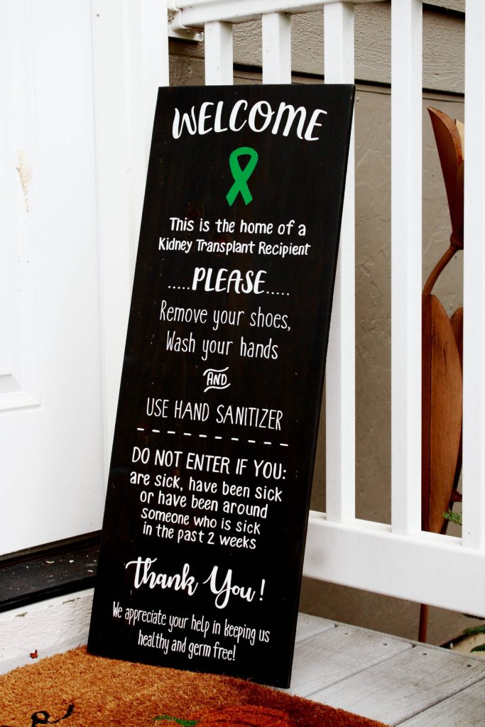 A sign in front of Dale and Denise Pacs home lets guests know that they are entering the home of a kidney transplant patient and to make sure to they are cautious about contamination. Photo by Keelin Everly-Lang / The Mirror.