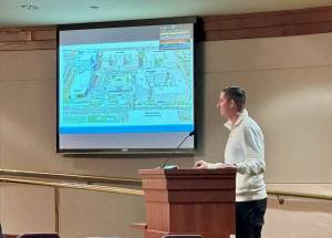 Principal of OneTrent Development Trent Mummery answers questions about the Town Center 3 development project at the special council session on Nov. 9. (Photo provided by City of Federal Way)