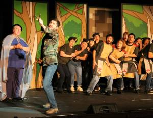 Photo courtesy of Kendra Breyer / St Lukes
St. Lukes Theatre Company presents its last performances of Cinderella on Nov. 18 and 19. Pictured: Prince Topher (played by Shane Welter) prepares to defend his kingdom from an attacking dragon while the apparently useless members of the regiment cower in fear behind him.