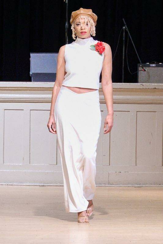 Model Osheea Davis (@osheeameriah) walks the runway at Ebony Fashion Week wearing ANIK Designs by Donnika Jackson. Photo by: Prince Davis. (@princedavis.work)