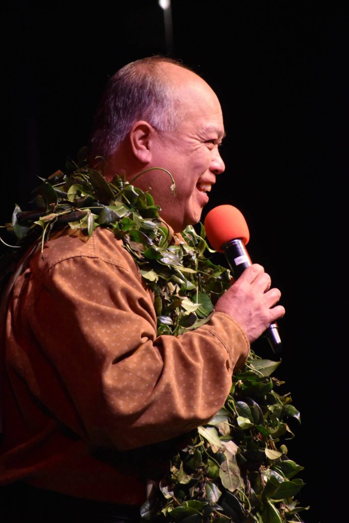 Kamaile Hamada speaks at the Aloha Kalikimaka 2023 opening ceremony. Photo by community member and photographer @t.g.koz on Instagram