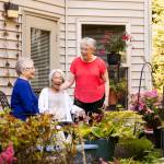 Senior living communities can help alleviate feelings of isolation and loneliness by providing a warm, welcoming environment. Village Green photo