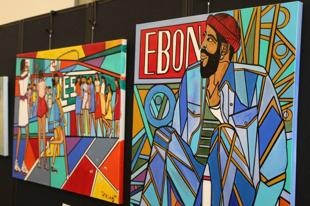 Two acrylic and marker pieces by artist Rodney King on display at the Arts Explosion event. The event was held for the first time this year during the first weekend in June. (Photo by Alex Bruell / The Mirror)