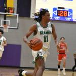 Will Tellis takes the ball for the Titans in transition. (Ben Ray / The Mirror)