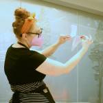 Photo by Keelin Everly-Lang / The Mirror
Jessica Hughes demonstrates how to make a one page zine at the zine making class at the Federal Way Library.