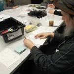 Alex Poorman works on a comic book during the zine class that he started creating during ComiCon last year. Photo by Keelin Everly-Lang / The Mirror