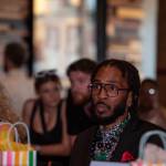 Rebecca Martin of the Federal Way Chamber of Commerce and Brandon Bain at the Washington state finals of the similar competition put on last year by the International Karaoke Foundation. Garvaundo Hamilton has now split from IKF to create Karaoke Idols. (Photo provided by Garvaundo Hamilton)