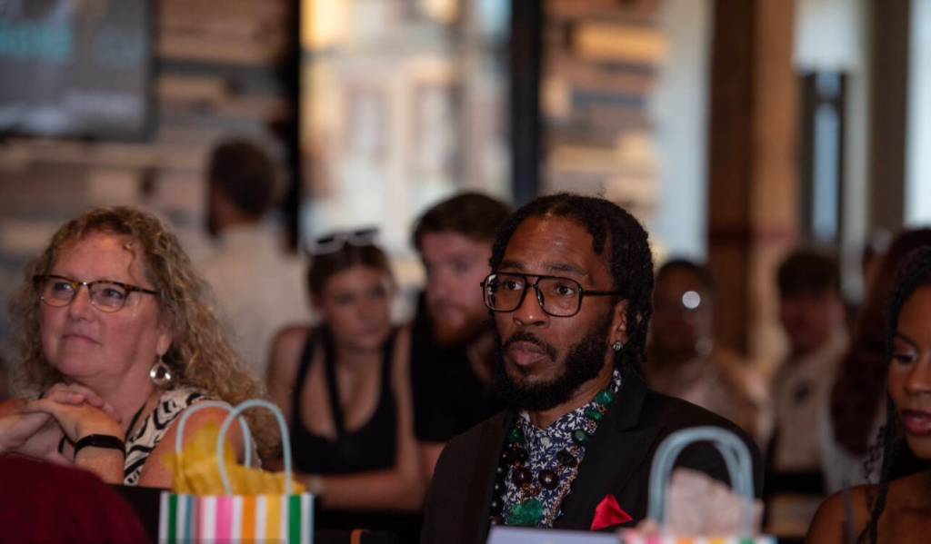 Rebecca Martin of the Federal Way Chamber of Commerce and Brandon Bain at the Washington state finals of the similar competition put on last year by the International Karaoke Foundation. Garvaundo Hamilton has now split from IKF to create Karaoke Idols. (Photo provided by Garvaundo Hamilton)