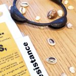 In his exhibit Unspoken Truths, collector and educator Delbert Richardson pairs primary sources like this bell collar that was put on enslaved people that ran away with stories of how people resisted the 400 years of forced labor. Photo by Keelin Everly-Lang / The Mirror