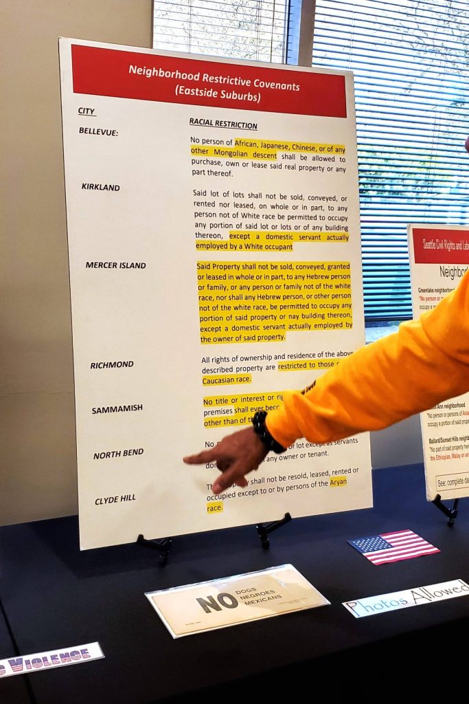 Racial restrictions were common throughout the past century in Seattle and the surrounding cities, including Federal Way. Delbert Richardson points out a restriction example in North Bend. Photo by Keelin Everly-Lang / The Mirror