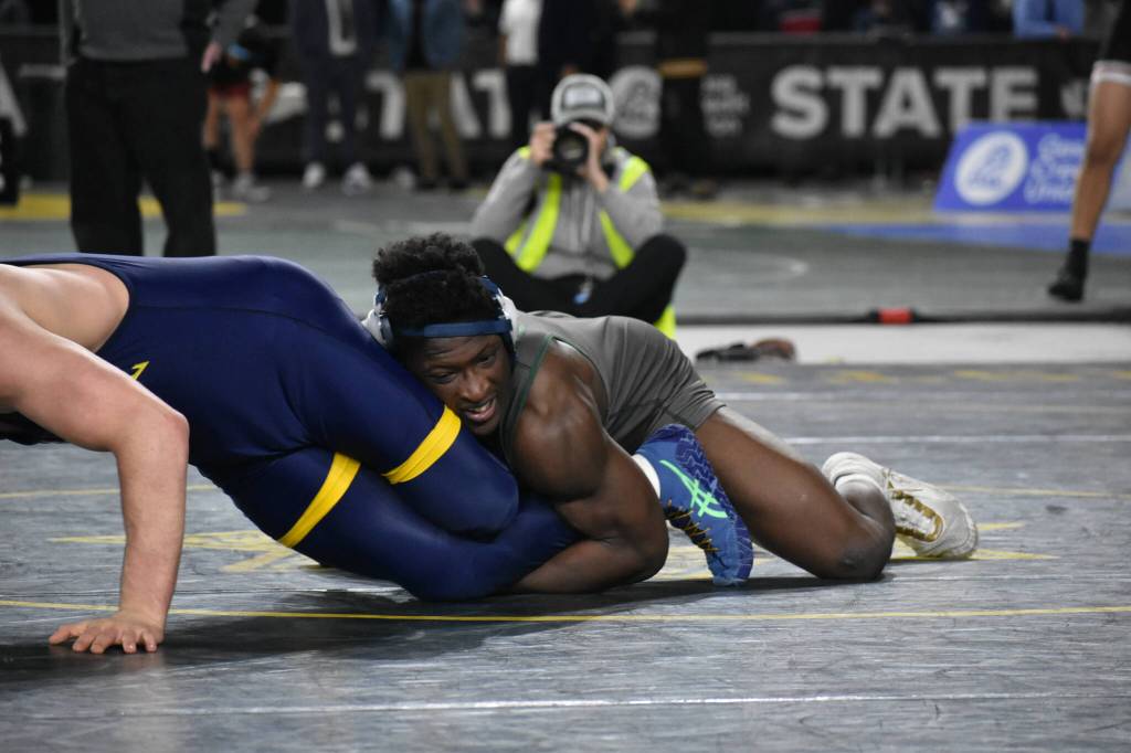 Sekou Bangoura gets a take down in the state final. Ben Ray / The Mirror