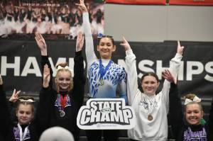 Joseline Abundis stands atop the podium at Sammamish High School. Ben Ray / The Mirror