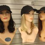 For clients who want to exercise or wear a hat while wearing hair, Master Hair Care offers different hats and caps with small hair pieces attached. Photo by Bailey Jo Josie/Sound Publishing.