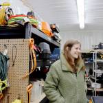 Amanda Miller at the South King Tool Library in Federal Way as she looks for a tool for a visitor. Photo by Keelin Everly-Lang / The Mirror