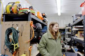 Amanda Miller at the South King Tool Library in Federal Way as she looks for a tool for a visitor. Photo by Keelin Everly-Lang / The Mirror