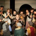 Lee Howard as Fagin surrounded by the youth in our 2019 production of Oliver! Photo provided by St Lukes.