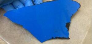 The Federal Way Police Department says officers recovered a fragment of blue plastic at the site of the collision they believe belongs to the suspect vehicle. (Courtesy of the Federal Way Police Department.)