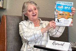 Community volunteer Karen Brugato talks about Federal Ways Arts Explosion Festival during the Mirrors Hot off the Presses community conversation event March 19 at Poverty Bay Cafe. During the monthly conversations, community members get an opportunity to talk about events and happenings in Federal Way. (Photo by Andy Hobbs/The Mirror)