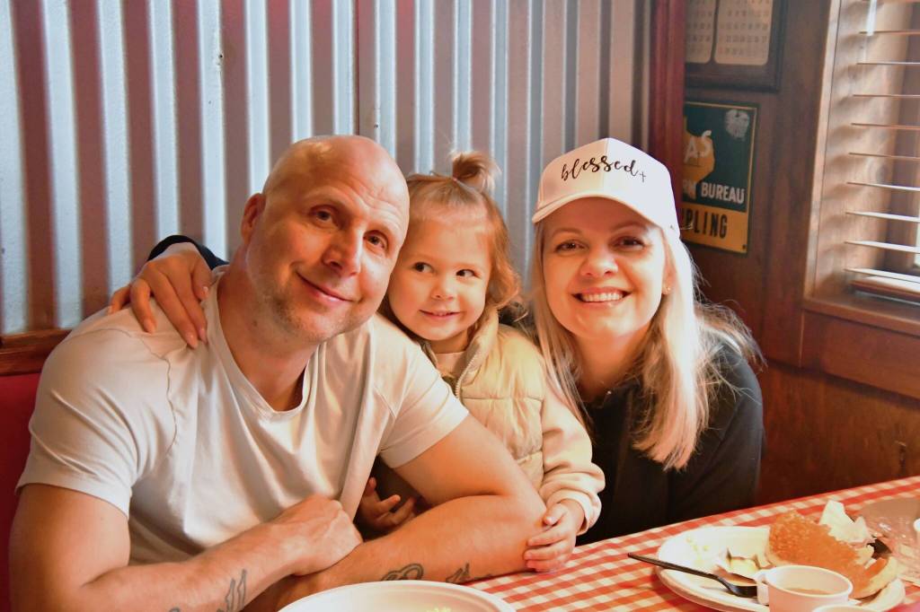 Families filled the booths at Jimmy Macs for a fundraiser for Young Life in Federal Way on March 23.