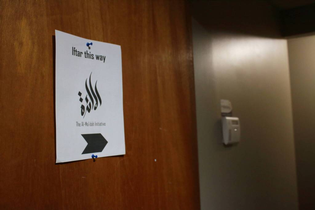 A sign directs guests to the community Iftar held by the Al-Maidah Initiative. Photo by Keelin Everly-Lang / The Mirror