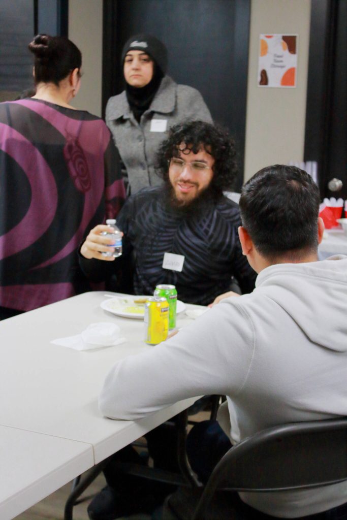 Even long after fasts were broken and food was cleaned up, guests at the Iftar hosted by the Al-Maidah Initiative were still deep in conversation. Photo by Keelin Everly-Lang / The Mirror