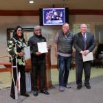 Leaders of the financial literacy classes pose while receiving their proclamation at the council meeting. Photo by Keelin Everly-Lang / The Mirror