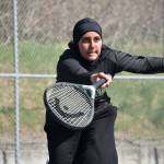 Lames Adballa lunges for a drop shot in her singles match at Decatur. Ben Ray / The Mirror