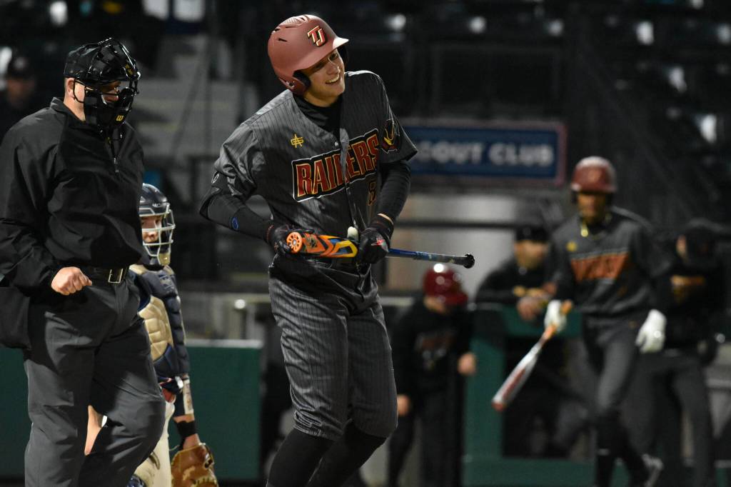 Thomas Jefferson shortstop/third baseman Kort Baker winces and smiles after he gets hit by a pitch. Ben Ray / The Mirror