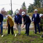 David Harrison, alongside other Fusion partners digging into the ground at their future duplex on April 11, 2024. Photo by Joshua Solorzano/ Federal Way Mirror