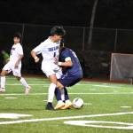 Adrian Alonso takes the ball from a Raven player. Ben Ray / The Mirror