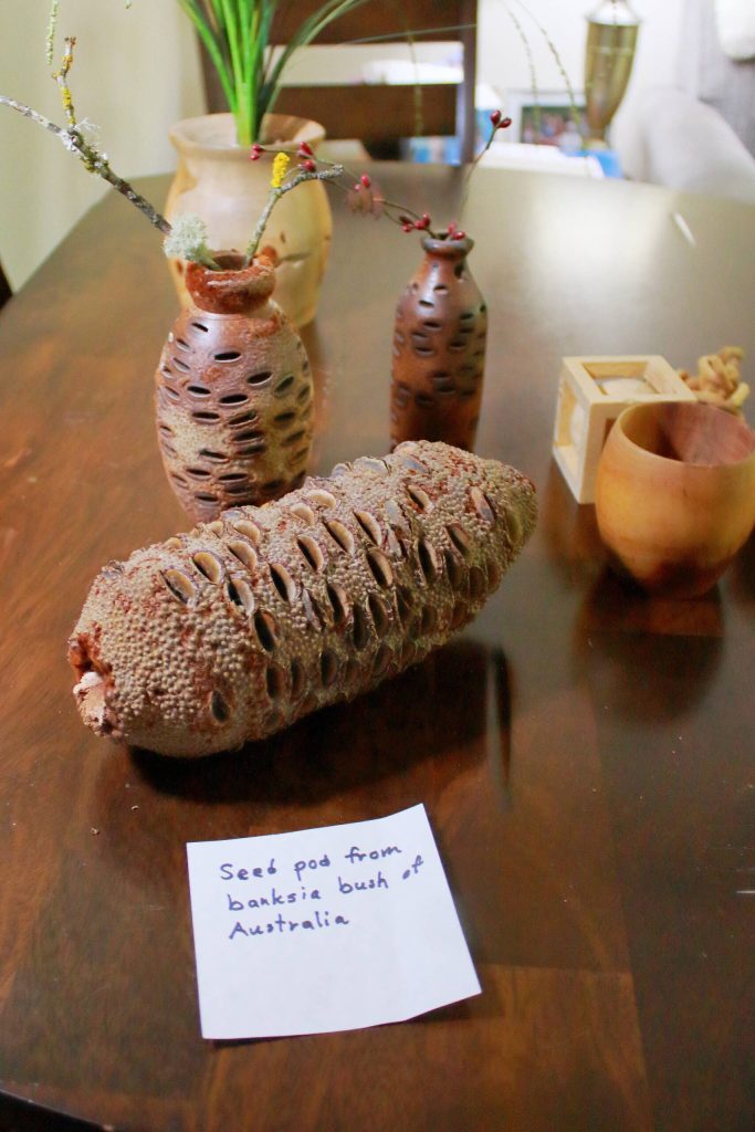 Artist Dick Ode will share vases, candle holders and more wooden pieces that he has created using wood turning techniques on a lathe. He enjoys using unique materials, like this seed pod from Australia that he purchased in Seattle. Photo by Keelin Everly-Lang / The Mirror