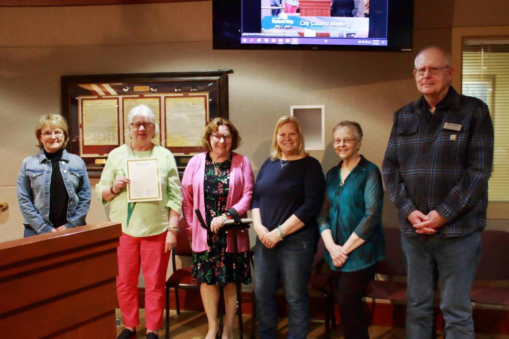 Members of the Federal Way Senior Advisory Commission: Debbie Harvey, Lana Bostic, Susan Honda, Tammy Dziak, Cheryl Volheim and Kenneth Pratt accept the proclamation for Older Americans Month. Photo by Keelin Everly-Lang / The Mirror