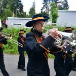 The Thomas Jefferson High School band, Federal Way Police Department motorcycle and bike patrol, Mayor Jim Ferrell, and Federal Way City Councilmembers Susan Honda and Jack Walsh joined the coaches and swim team captains in the annual Marine Hills Pool Opening Parade on May 18. Photos by Bruce Honda