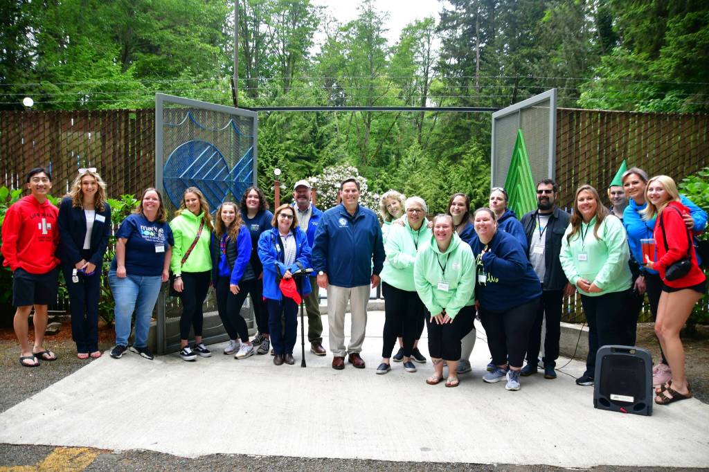 The Thomas Jefferson High School band, Federal Way Police Department motorcycle and bike patrol, Mayor Jim Ferrell, and Federal Way City Councilmembers Susan Honda and Jack Walsh joined the coaches and swim team captains in the annual Marine Hills Pool Opening Parade on May 18. Photos by Bruce Honda